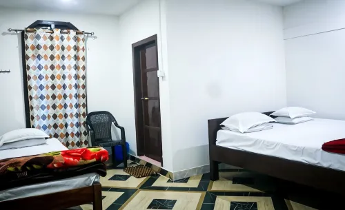Homocation - Manorama Lodge - parking
