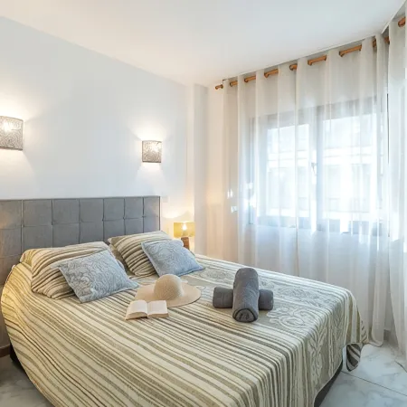 Beachfront Apartment in Lubina del Sol | Pool, Padel, Parking &  Beach Access