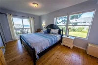 Cloud Nine - A Charming Ocean View Home with Hot Tub & Fire Pit in Belle Beach! - Wifi