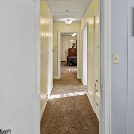 Home adjacent to Country Club, near Hospitals, Park, College and shopping.
