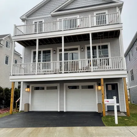 Brand new house with water views just steps from beach!