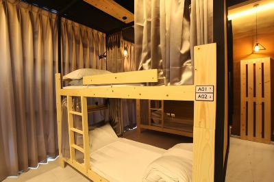 Bed In 10-Bed Mixed Dormitory Room Light Shadow Photo