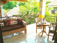 Qiul Guest House Hoteles cerca de Museo de Arte Angung Rai (ARMA