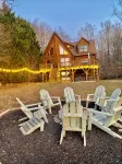 Enchanting 5-Bed/5-Bath Lakefront Log Cabin with Private Cove, Beach & Hot Tub.