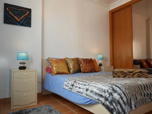 2 bedroom top floor apartment, swimming pool, Air-Con.