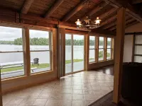 Beautiful private beach area within steps from the modern updated log home - 3-Star