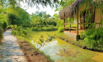 a serene scene of a pond surrounded by lush greenery , with a wooden walkway leading to a gazebo at Riverside Park Eco Resort
