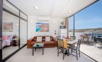 Harbour Lights Seafront Penthouse by Getaways Malta