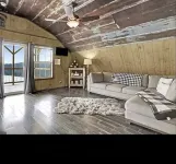 Converted barn with great views, hottub, pool table, shuffleboard & firepit.