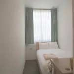 Kamiooka SK Hotel Hotels near Yokodai Station