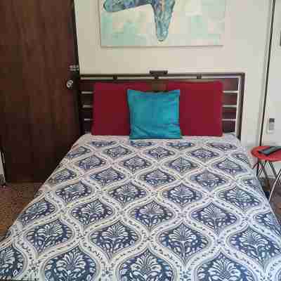Stay as a tourist & feel as a local; Beach & Loiza st. strip, everything near! Rooms