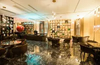 Huarong Mingwei International Hotel - servizio colazione
