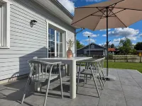 Vacation home by the lake with sauna, barbecue and close to the beach