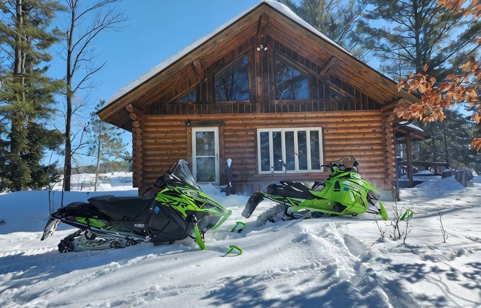 cozy lake house, full log cabin on beautiful shell lake, w/ wonderful loft.