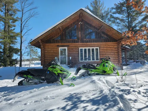 cozy lake house, full log cabin on beautiful shell lake, w/ wonderful loft.