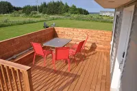 Renovated family cottage; walk to amazing beach, short drive to golf & town - 2-Star