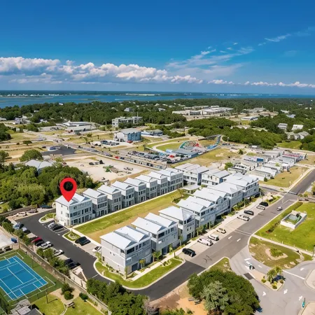 Just steps away - beach, pool, & attractions on the Emerald Isle! New Home.