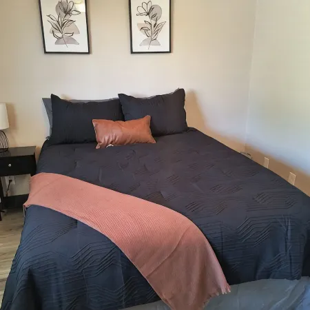 Centrally located close to everything with private entry and private yard.