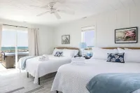 Oceanfront Family Cottage: Hot Tub, Heated Pool. Game Room & Stunning Beach View - 4-Star