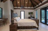 Walk to world famous Maho Bay! Privacy, views, pool, 4 equal king size bedrooms.