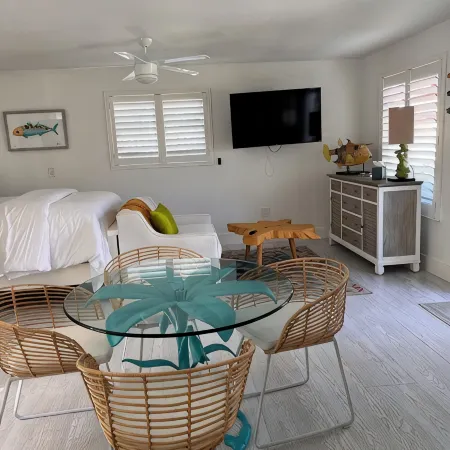 The Historic Coquina Cottages C is 2 Blocks to the Beach, 5th Avenue and 3rd St.