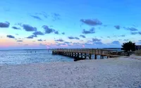 No Cleaning Fee! Brand New Double Queen Studio Condo w/ Waterfront Pool + Beach