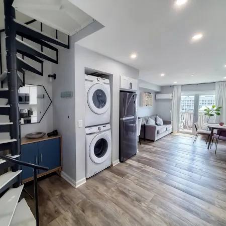 Lovely Renovated 2-Level Condo + Pool + Steps to the Beach!