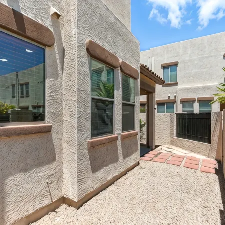 Charming 2-bedroom townhome near ASU in Tempe  with AC, garage, and a pool!