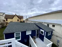 Stand-alone cottage, ocean view, seconds to beach, and short walk to downtown!