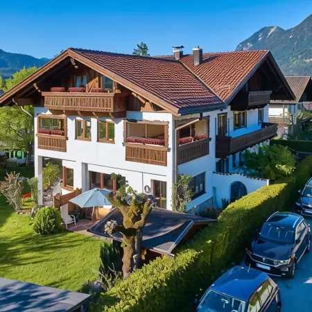 Cozy 65 sqm attic apartment with open roof truss and two balconies
