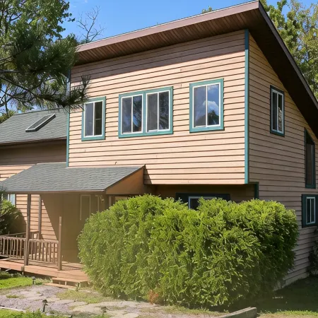 Lakeside cabin with Hot Tub and full kitchen!  Sleeps up to 12 people.