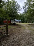 Rustic 2-bedroom cabin next to 1000+ acre Conservation area near Mark Twain Lake - Homestays