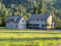 Spacious family home on the banks of the Little Red River in Heber Springs AR.