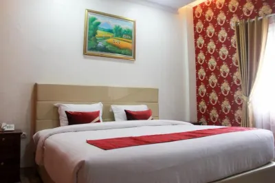 edOTEL MANGGALA Hotel dekat Taman Pintu Kampung Blok DD Palm Ganda Asri 2