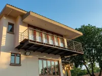 Global Village Guest House - parking