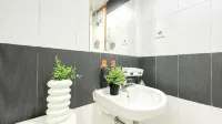 Scandinavian Minimalist 2BR at Cinere Bellevue Suites Apartment By Travelio
