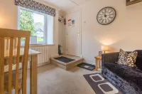 The Retreat, steps from amenities, short walk from Lake Windermere. Eco Friendly - Condos