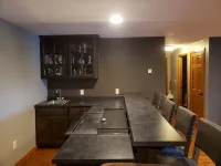 Three bedroom hide-a-way with spacious deck over looking Island Lake.