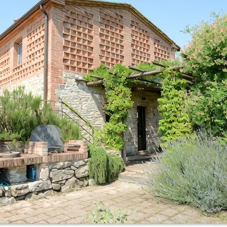 Tuscan village in SIena. farmhouse surrounded by garden,pool and panoramic view