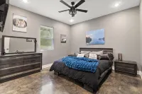 Richland Chambers Lakefront 2-story home with boat dock and pavilions.