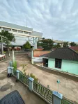 Losmen Al-Mukkaromah Hotel di Kebun Bunga