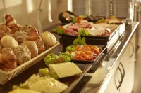 Sunday Hotel Stade Herzog Widukind - Desayuno