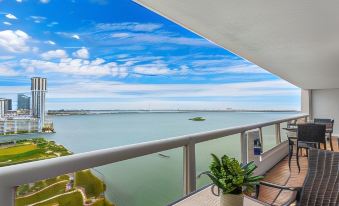 Bayfront Gem with Balcony and Pool