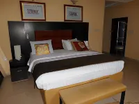 Nesville Suites Hoteles cerca de Big Qua Shopping Complex