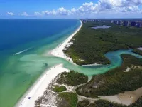 1 Mile to Beach! Tropical Getaway Home w/ Pool & Grill