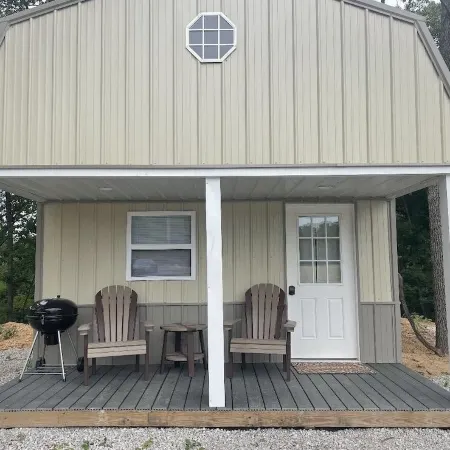 Tan cabin close to University of Central Missouri and Whiteman AF Base