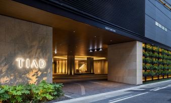 TIAD, AUTOGRAPH COLLECTION