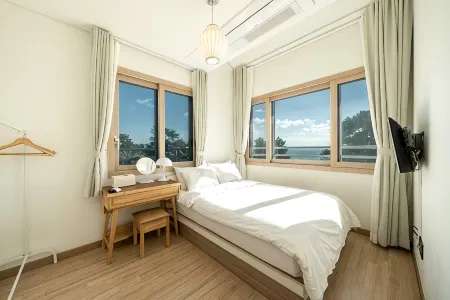 Seogwipo Soesokkak Recreation Pension Отели рядом с достопримечательностью «Soesokkak Estuary»