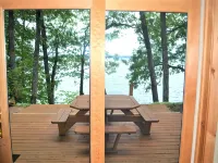 Stunning Sunrises from spacious Big Round Lake Cabin Hotels in Round Lake