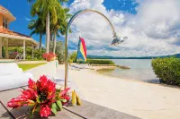 A luxurious beachfront villa with private beach on a calm lagoon. Montego Bay JA - 4-Star